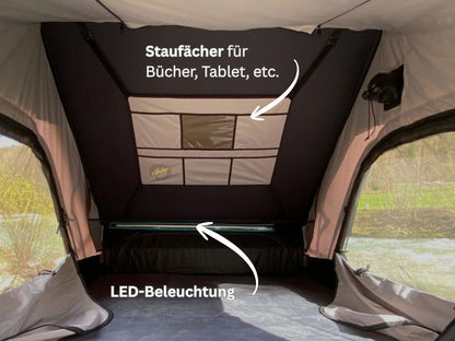 Innenansicht Hartschalendachzelt mit LED-Beleuchtung und Staufächern